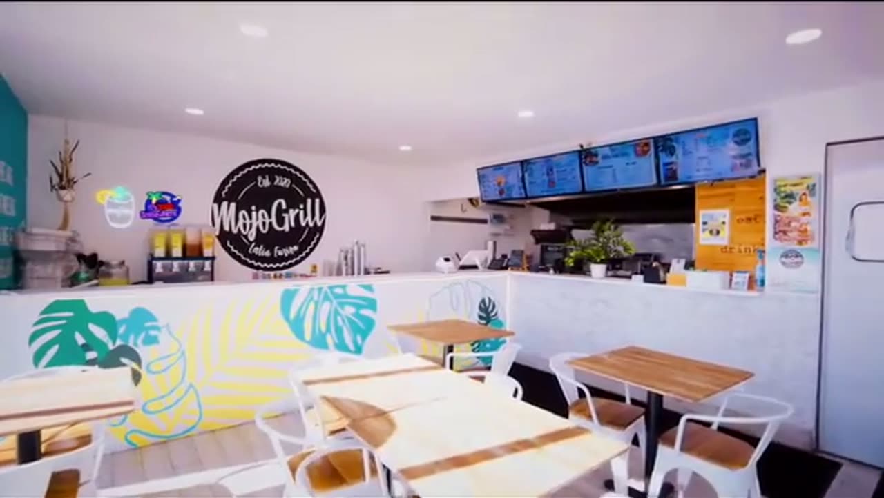 The bright dining room at Mojo Grill Latin Fusion